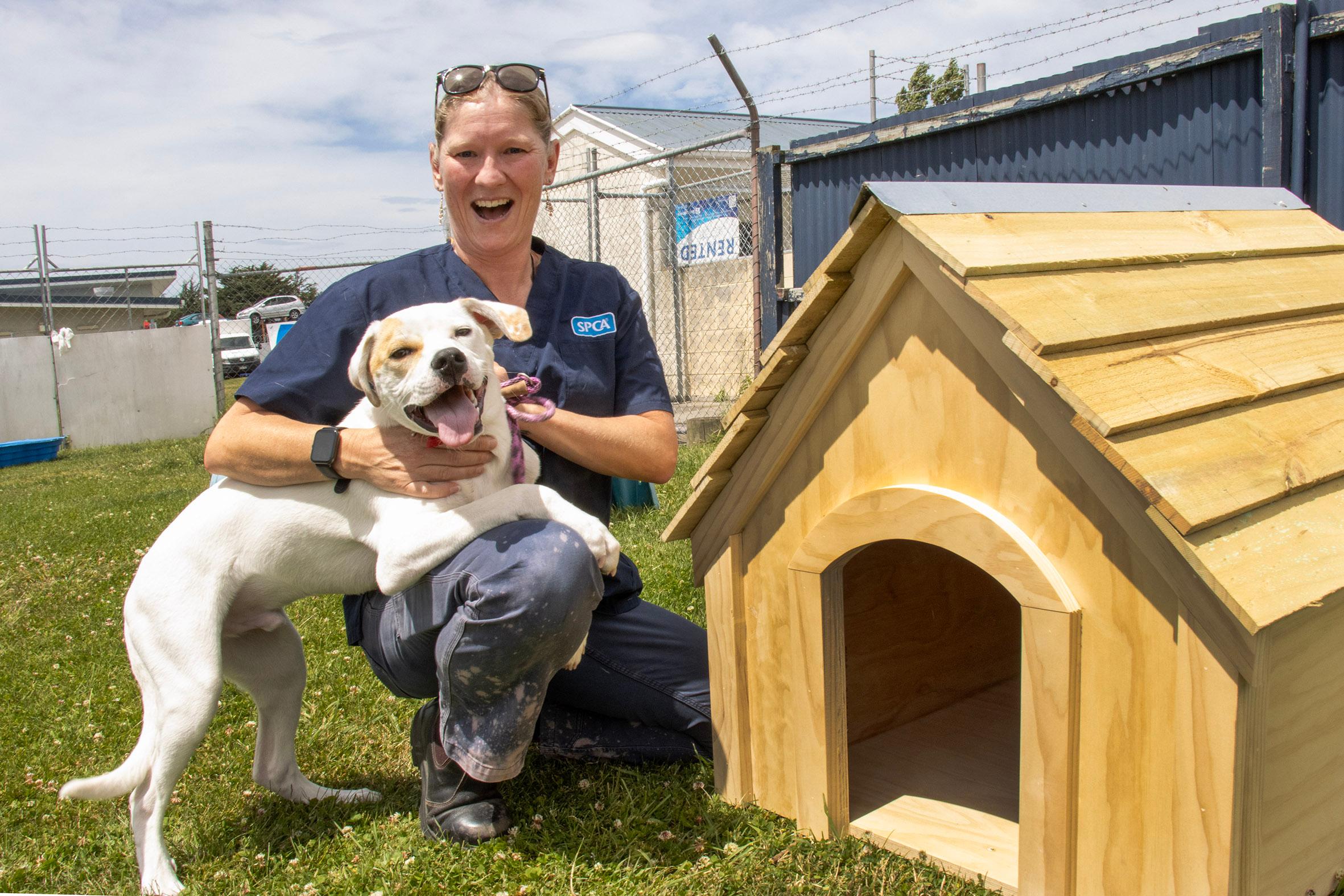 SPCA Christchurch Centre manager Natasha Sutton and mixed-breed Manny with his new kennel. PHOTO:...