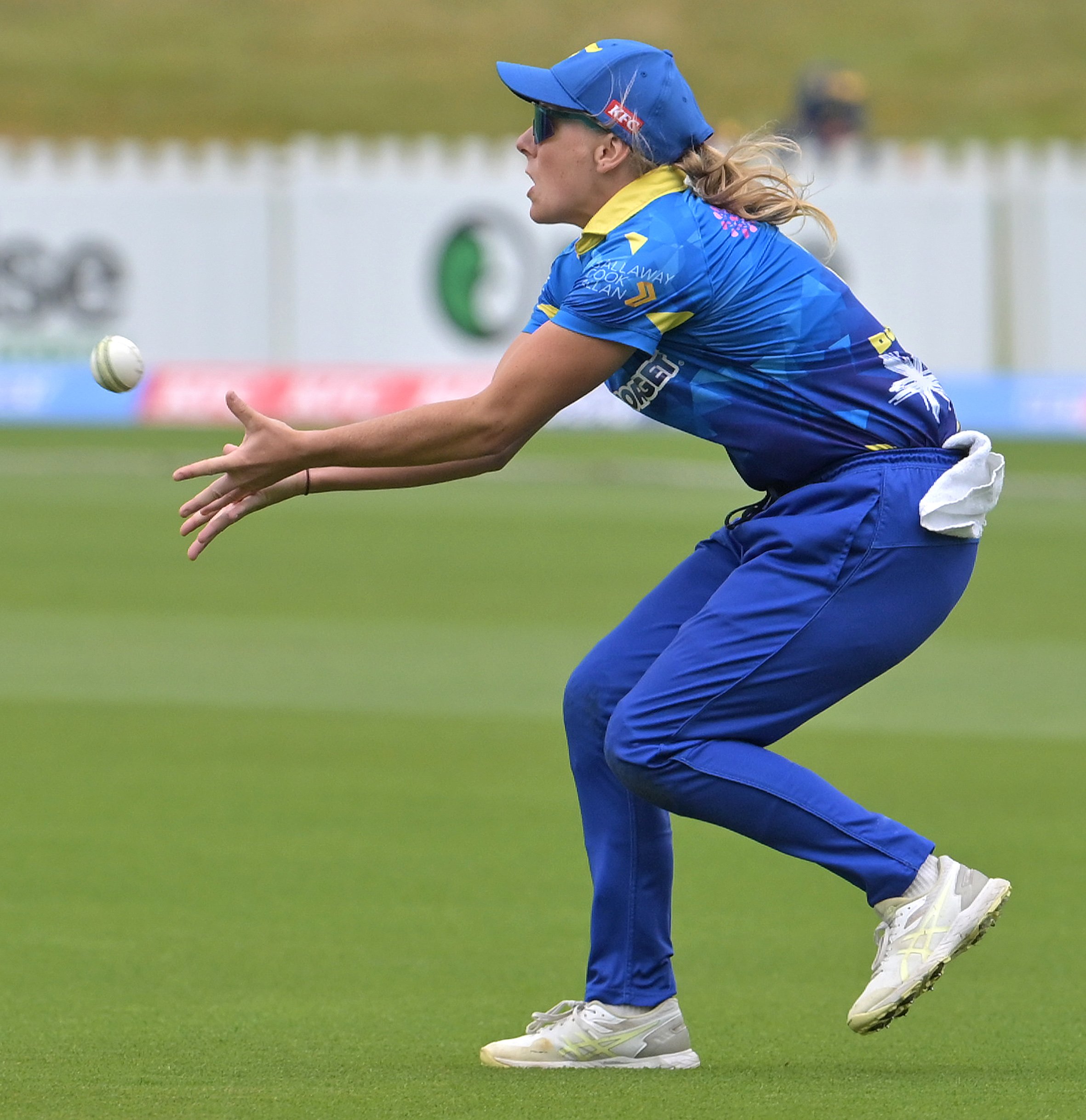 Caitlin Blakely, of the Sparks, watches the ball into her hands as she takes a catch to dismiss...