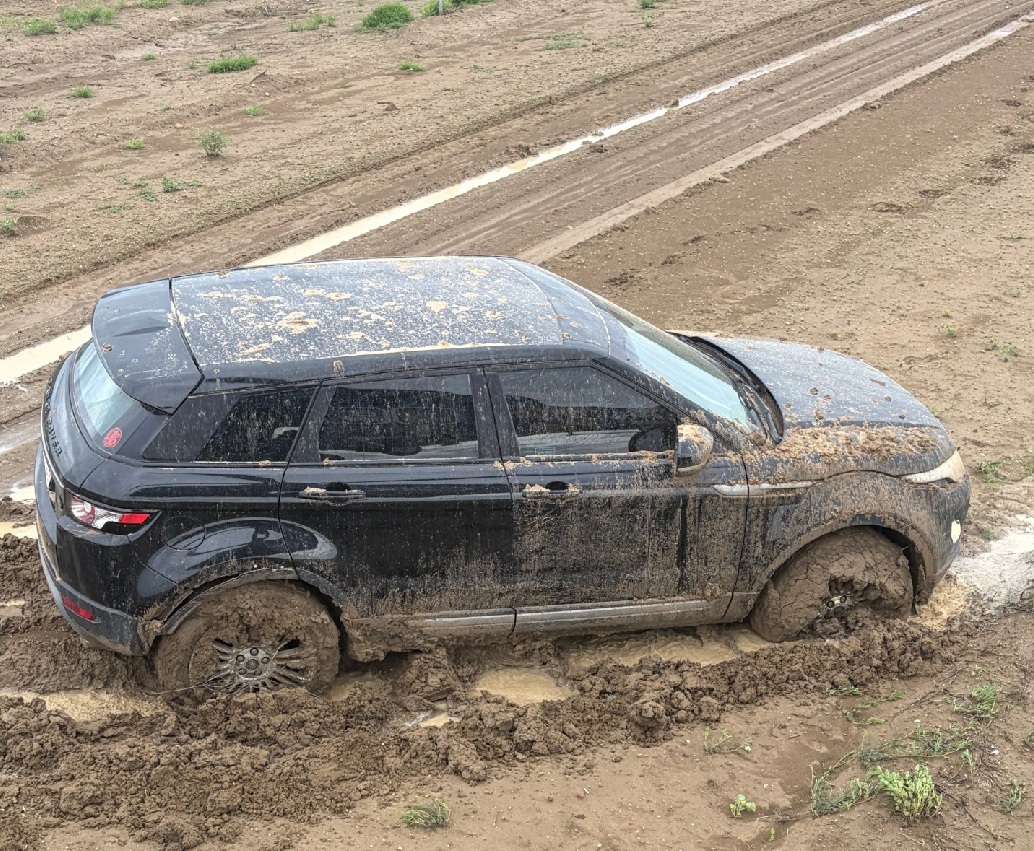 The mud which bogged the man's car was ankle to knee-high in depth in many areas. Photo: LIFEFLIGHT
