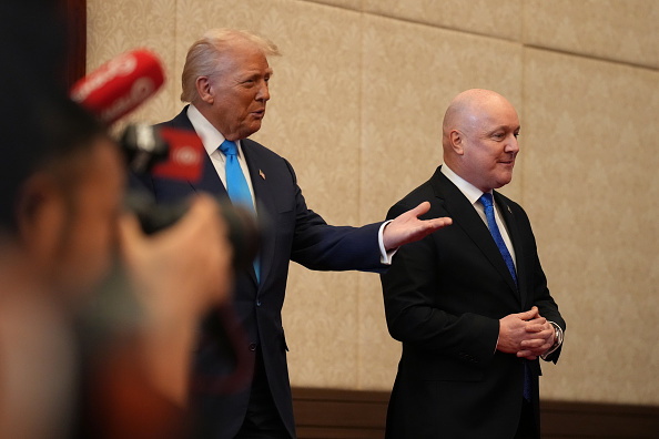 US President Donald Trump and New Zealand Prime Minister Chris Luxon in South Korea last year....