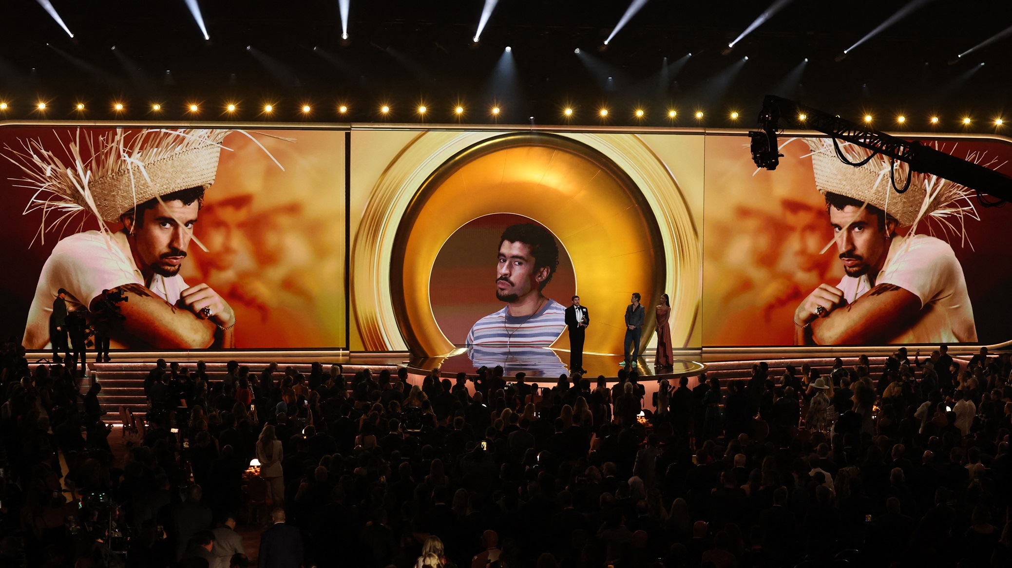 Bad Bunny accepts the award for Album of the Year for Debí Tirar Más Fotos as presenter Harry...