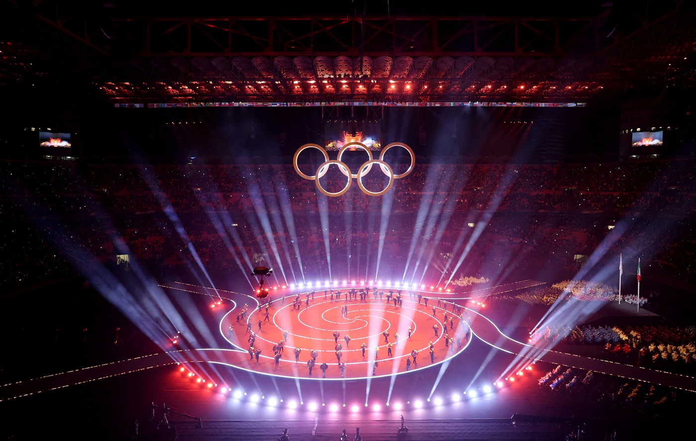 Dancers perform during the opening ceremony of the 2026 Winter Olympics at the San Siro Stadium...