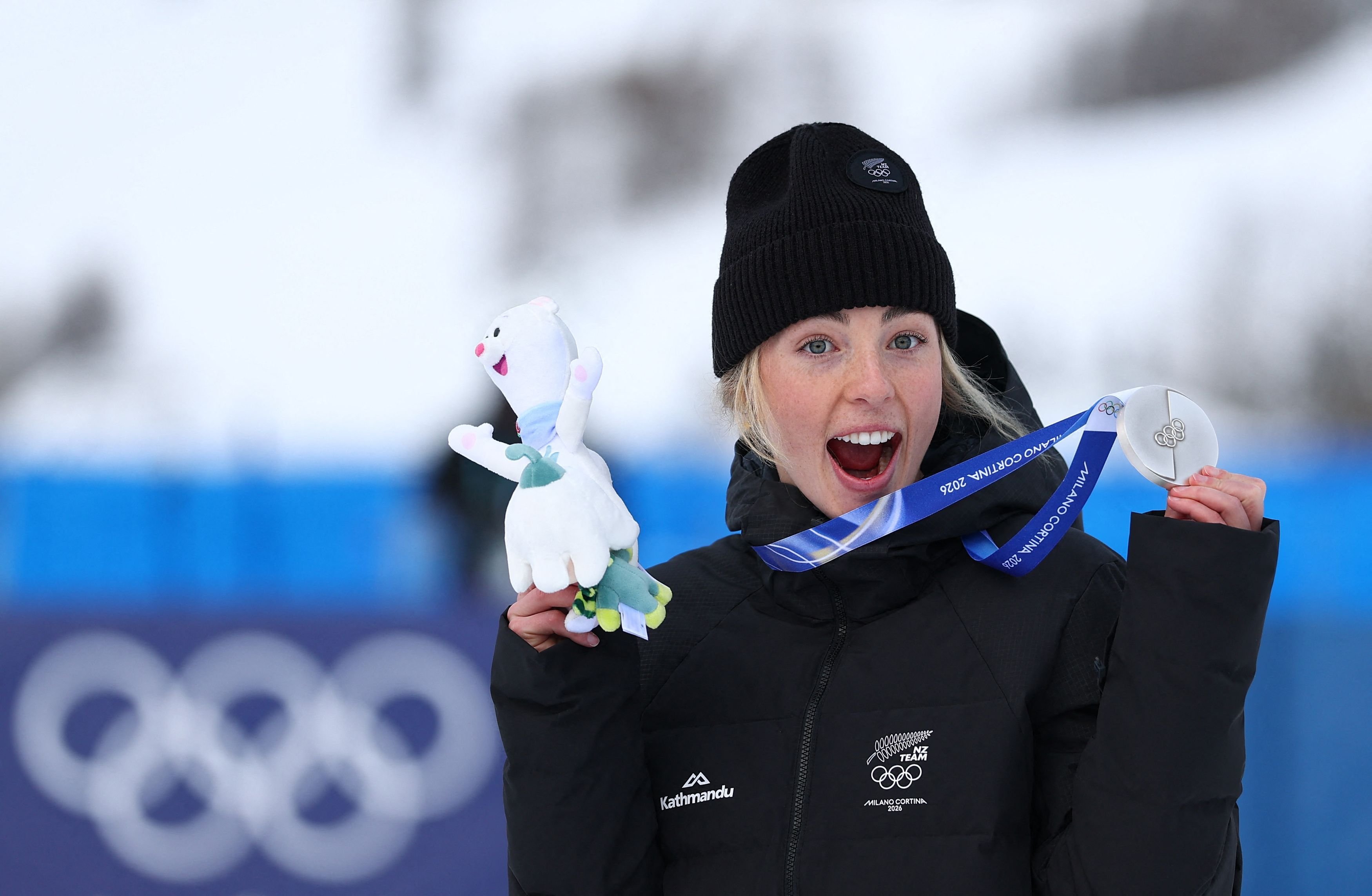 Silver medallist Zoi Sadowski-Synnott celebrates on the podium during the women's snowboard...