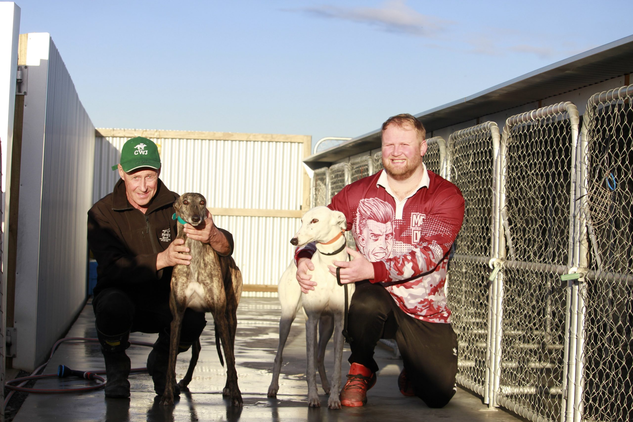 Tony Hart and his stepson Dylan Voyce are happy doing what they love, training greyhounds, as...