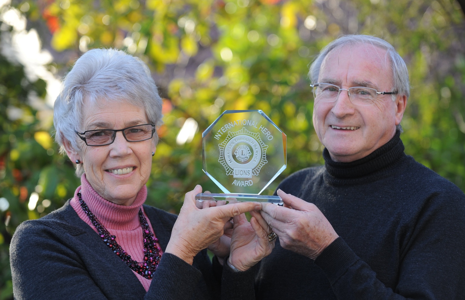 Genny and Tony Hanning in 2009, holding an international Lions award awarded to Mrs Hanning....