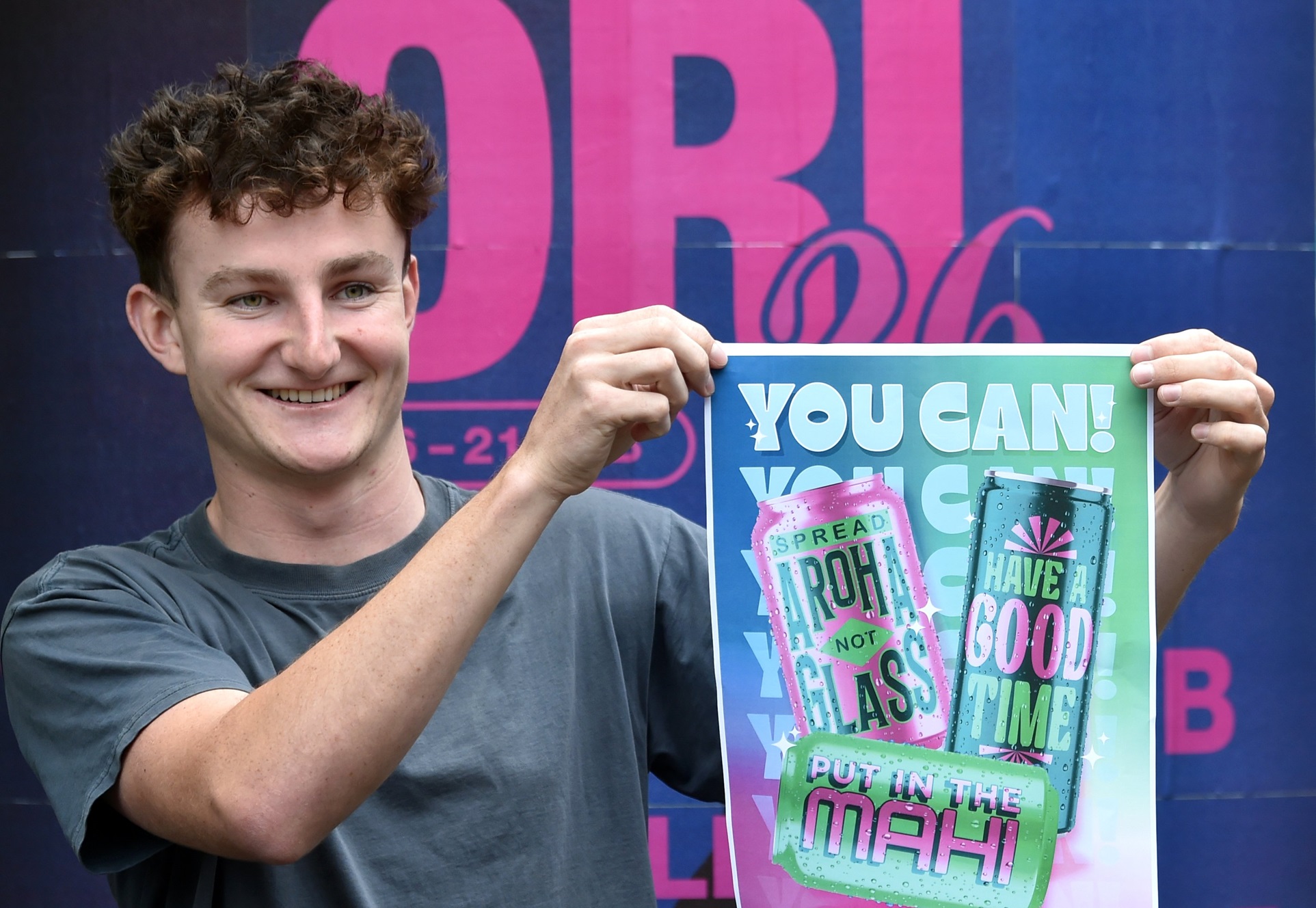 Otago University Students’ Association president Daniel Leamy, pictured with a campaign poster...