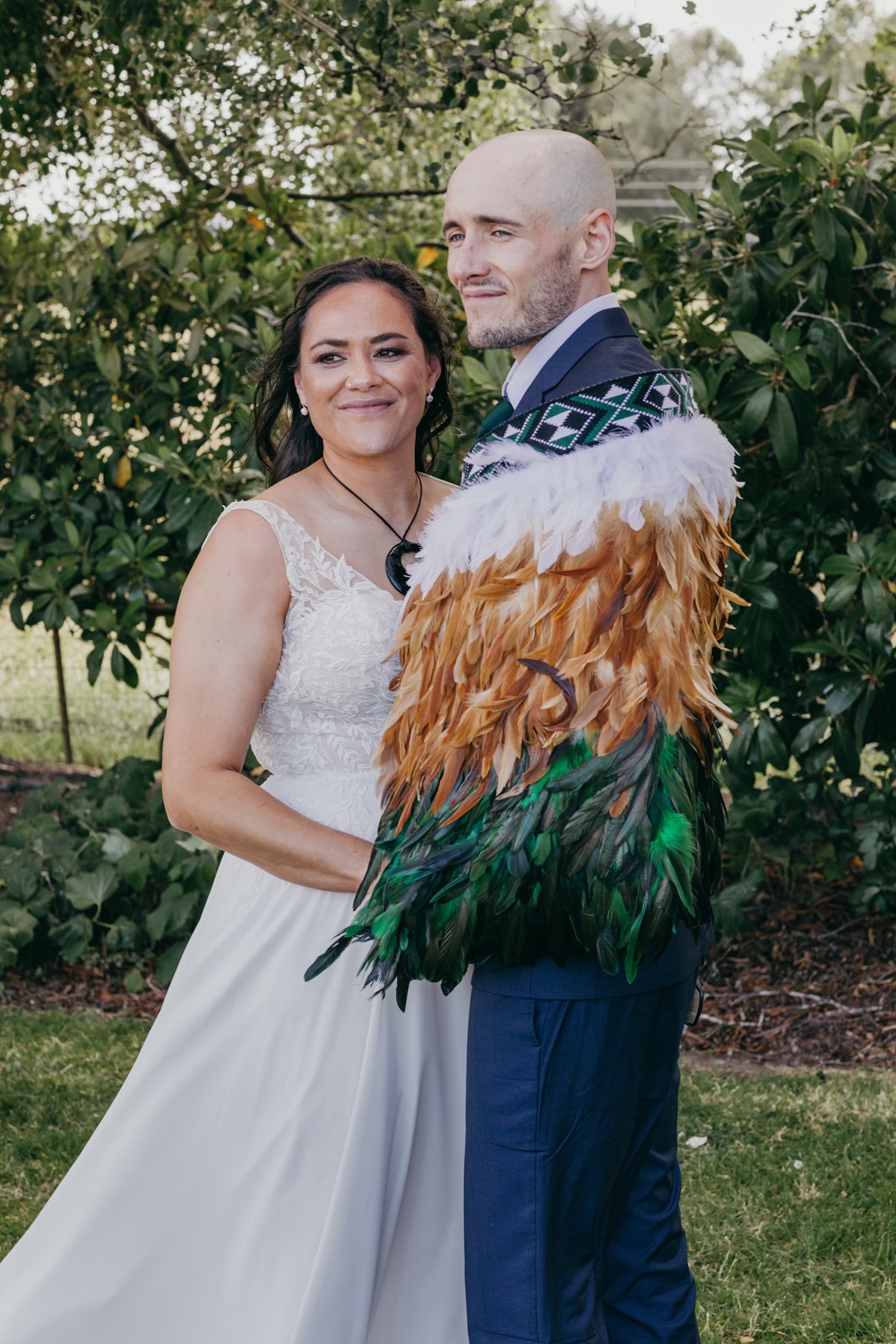 The three-tier chocolate wedding cake.

