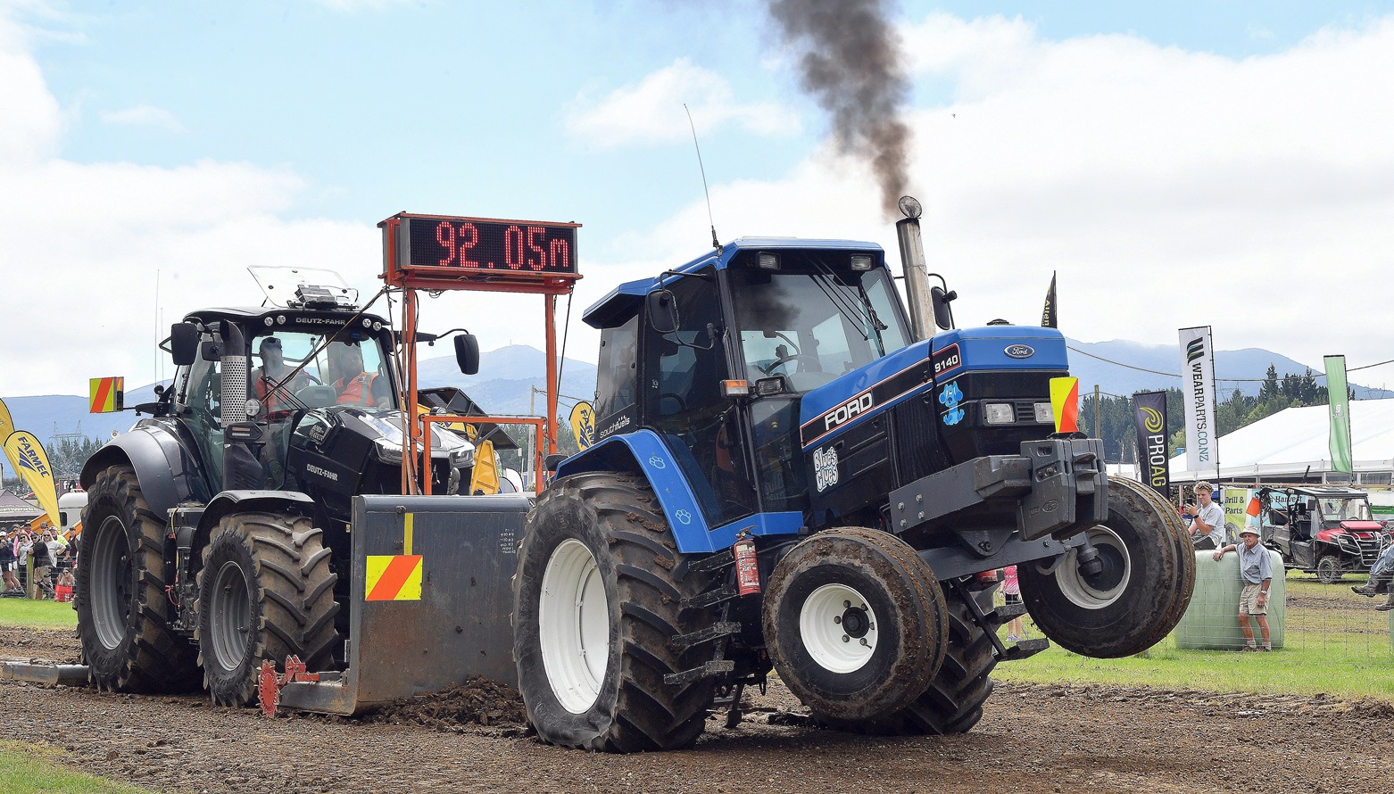 Competitors take part in the tractor pull during the Southern Field Days in Waimumu, Southland,...