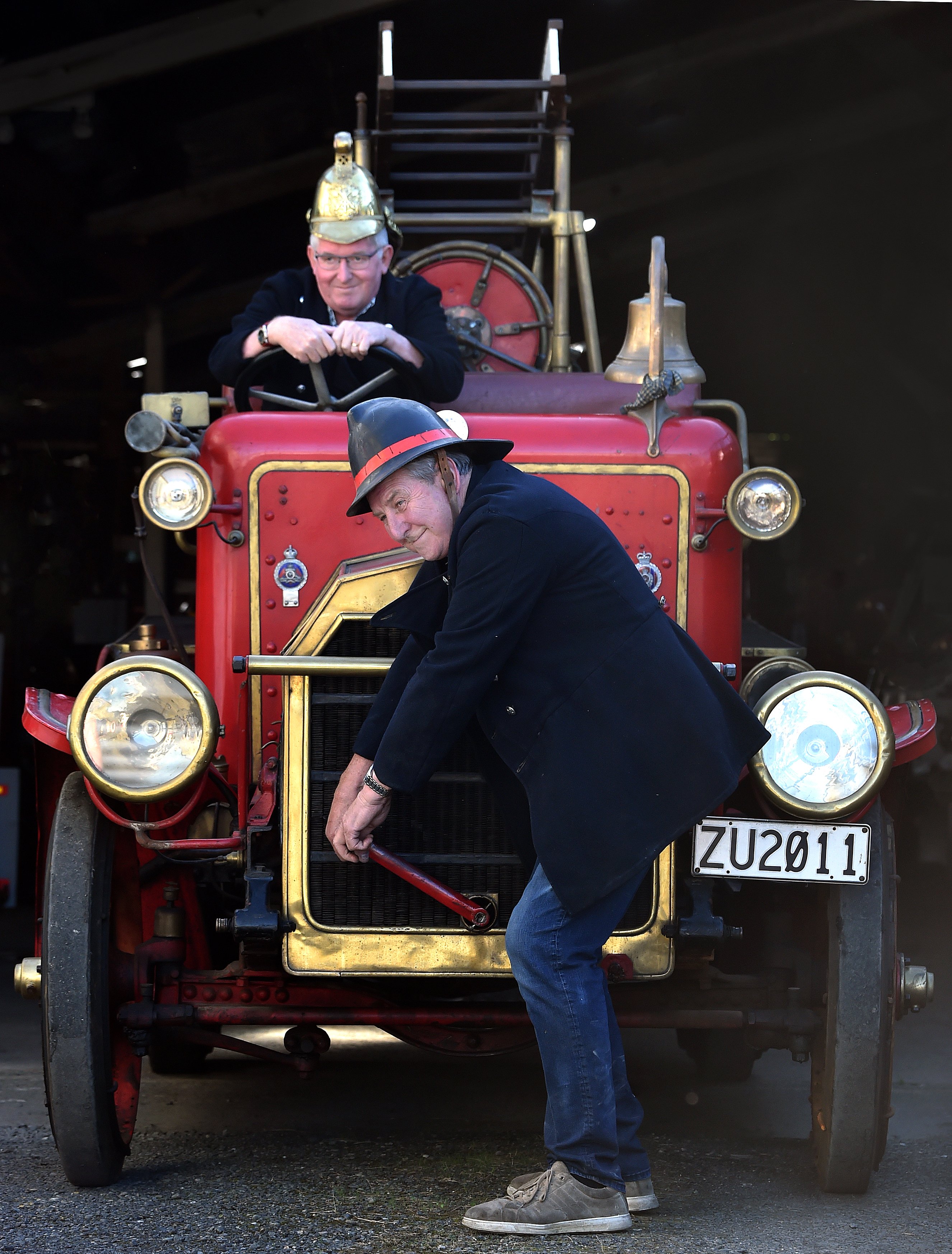 Norm Oakley gets ready to drive his family’s 1916 Dennis fire engine while Dunedin Fire Brigade...