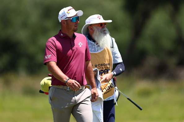 Australian golfer Lucas Herbert (left) and caddie Nick Pugh at The Royal Melbourne Golf Club in...