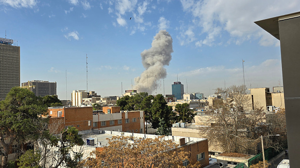 A plume of smoke rises following a reported explosion in Tehran. Photo: Getty Images