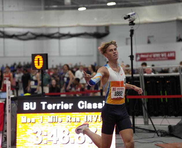 Sam Ruthe breaks the New Zealand indoor mile record in Boston. Photo: Aaron Bui/Athletics NZ