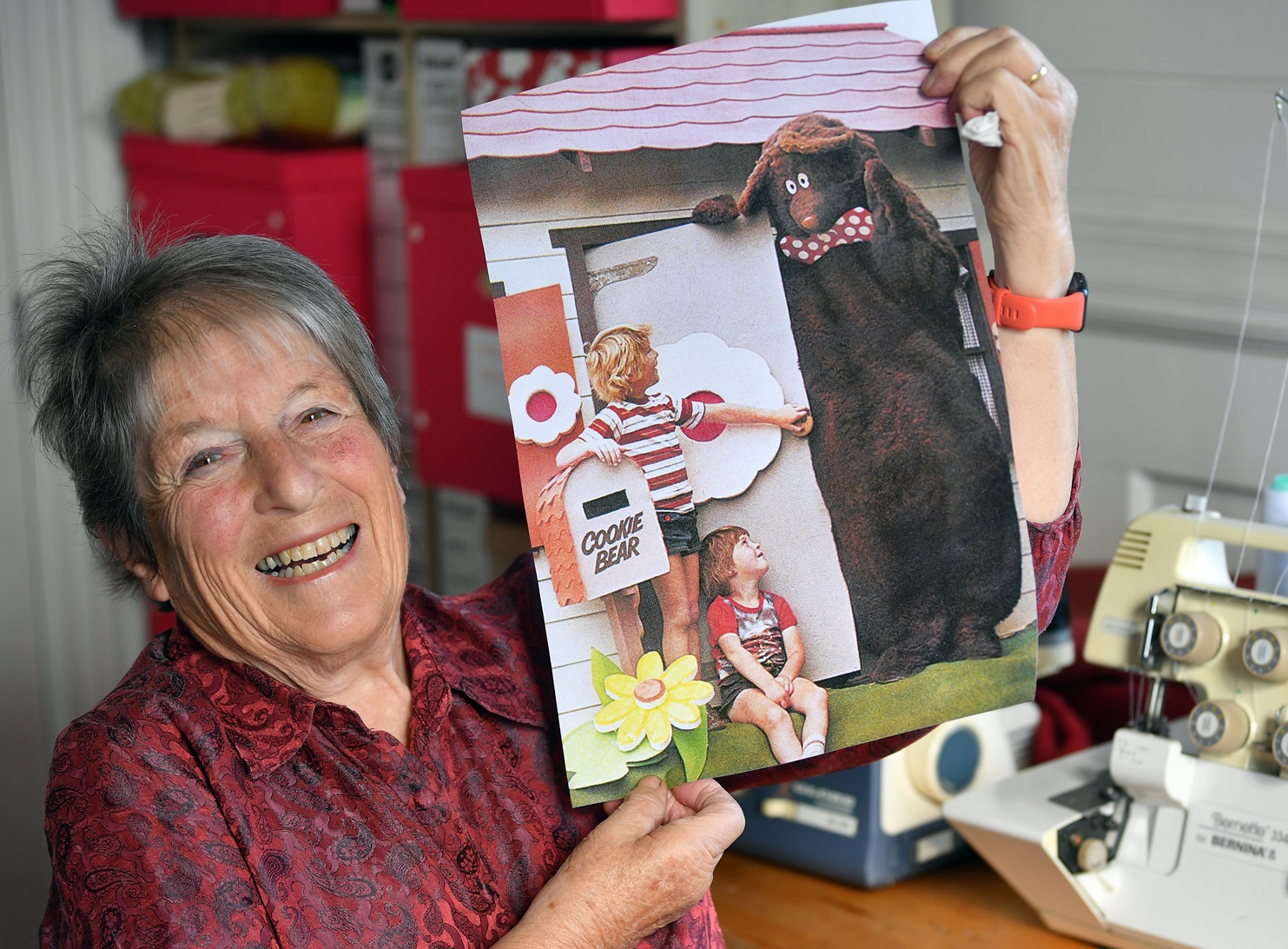 Maria Barta admires an image of her children Simon (left) and Rhian Hinkley with Cookie Bear. It...
