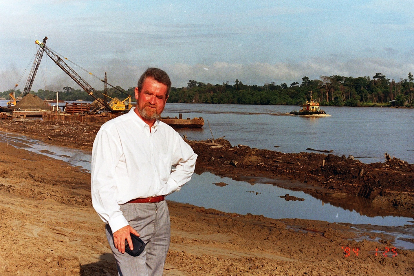 Stew MacLeod on-site at a proposed new port complex in Miri, Malaysia, in the mid 1990s, where he...