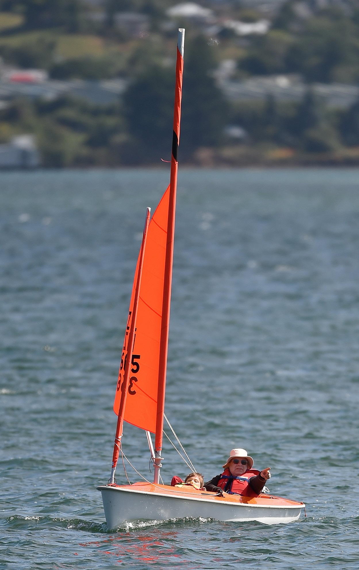 Sailability volunteer Peter Dowden takes George Murray, 10, of Oamaru, for a sail at Broad Bay on...