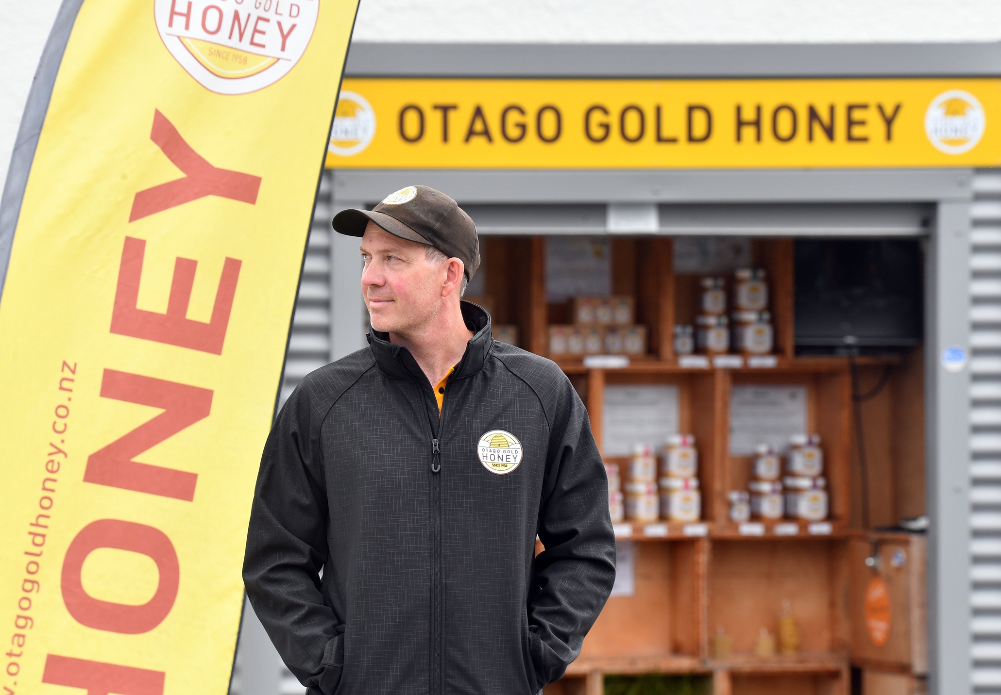 Otago Gold Honey co-owner Tim Sinclair stands guard outside his Waihola stall. Photo: Stephen...