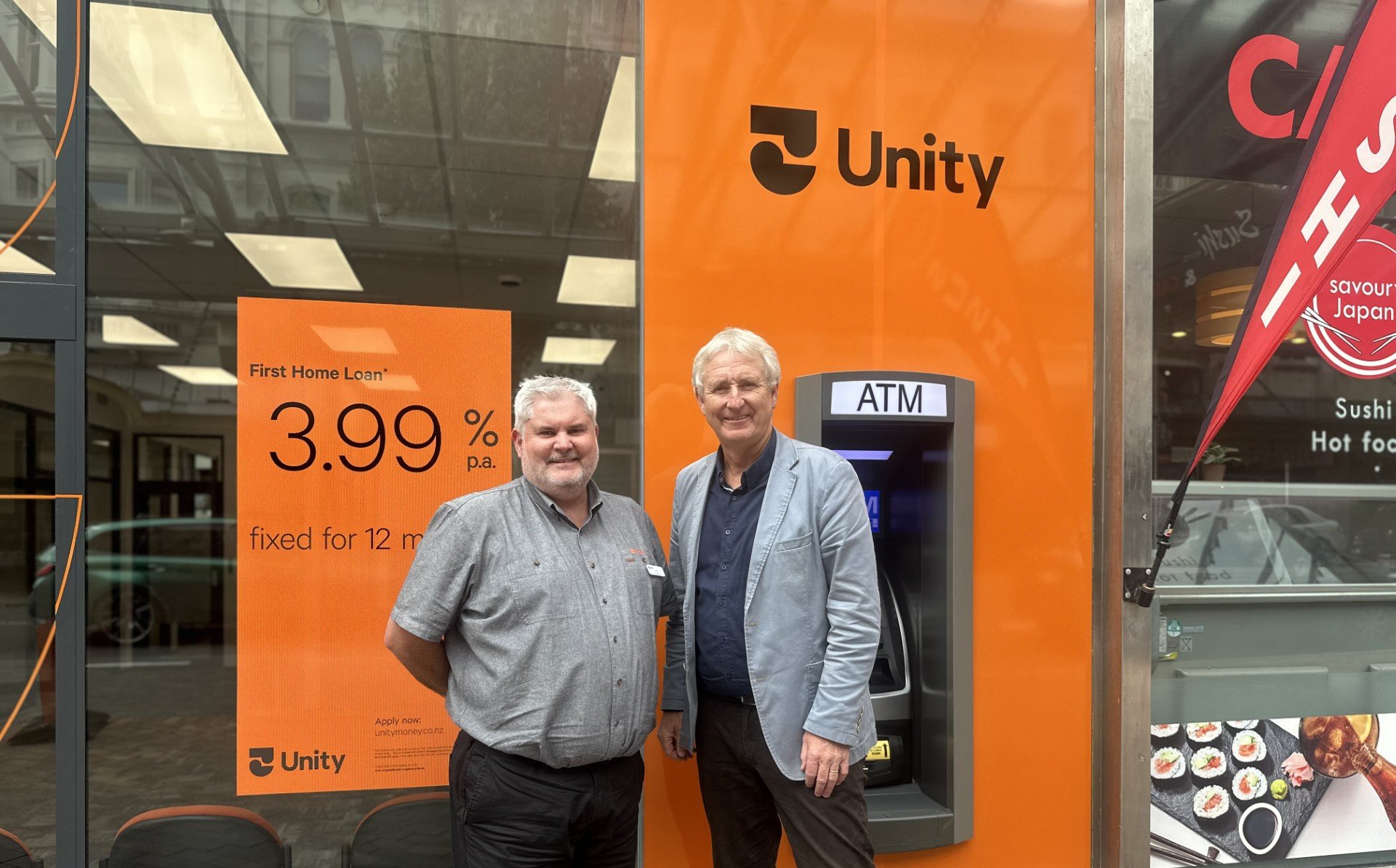 Unity Credit Union Dunedin branch manager Chris Laws (left) and chief executive Kevin Hughes...