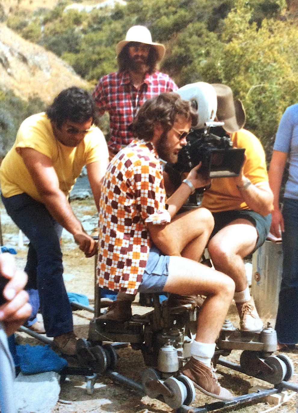 Grip Peter Mardell, focus Brian Nelson, camera operator Mike O'Connor and Max Quinn, looking on,...