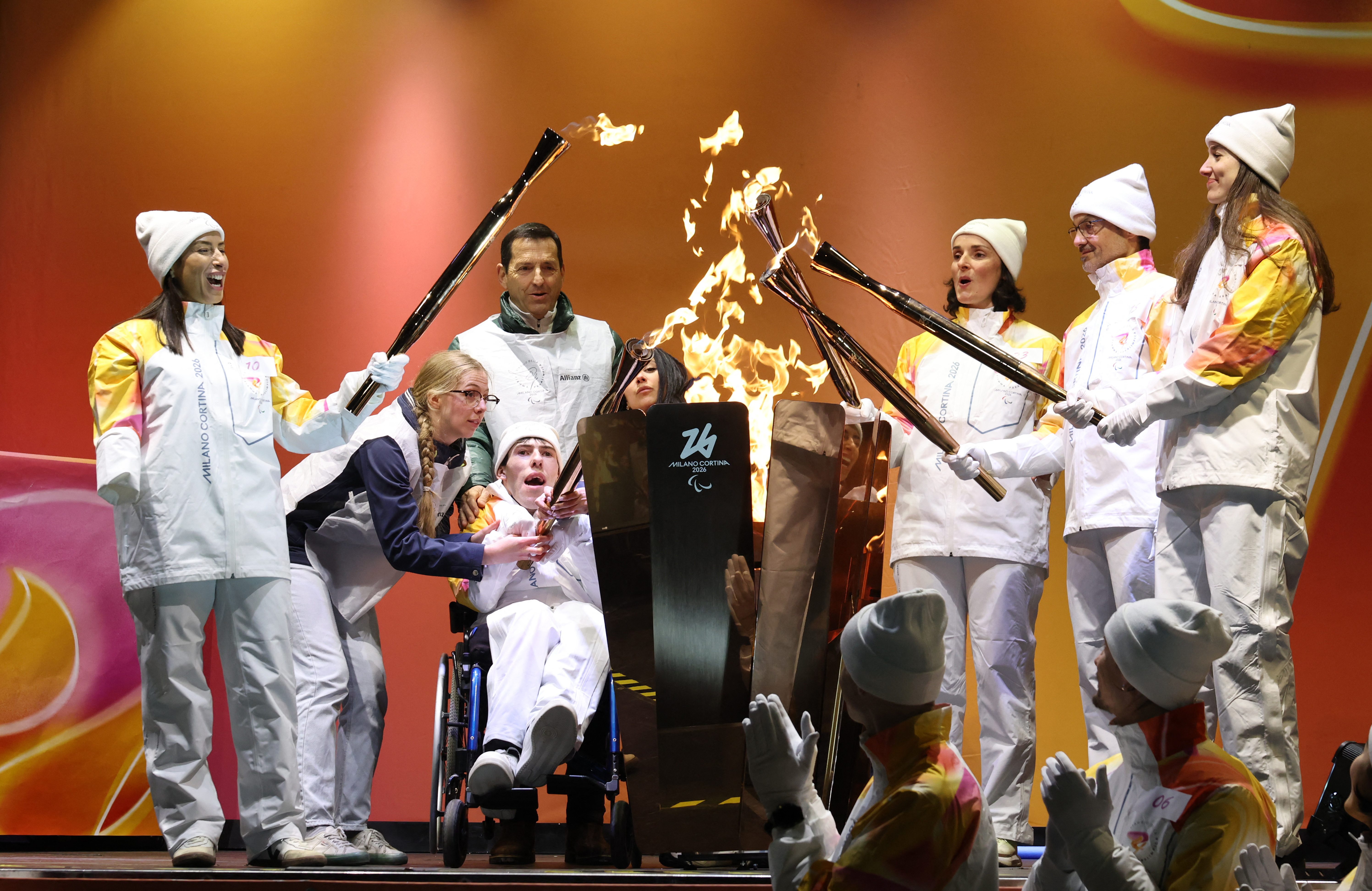 Torchbearers ahead of the Milano Cortina 2026 Winter Paralympics. Photo: Reuters 
