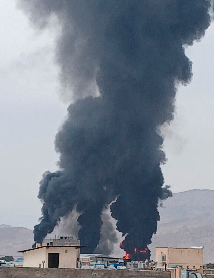 Smoke rises in the Kerman province, following a reported strike on its airport amid the US...