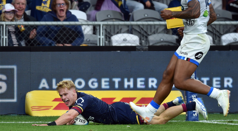 Finn Hurley scores a try against the Blues in 2025. Photo: Peter McIntosh