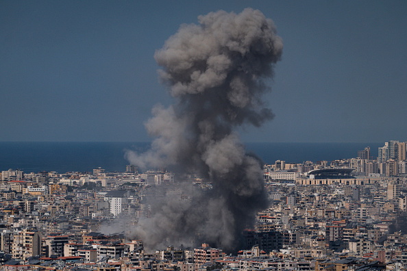Smoke rises from a building hit in a bombing in Beirut, Lebanon, last week. Photo: Getty Images