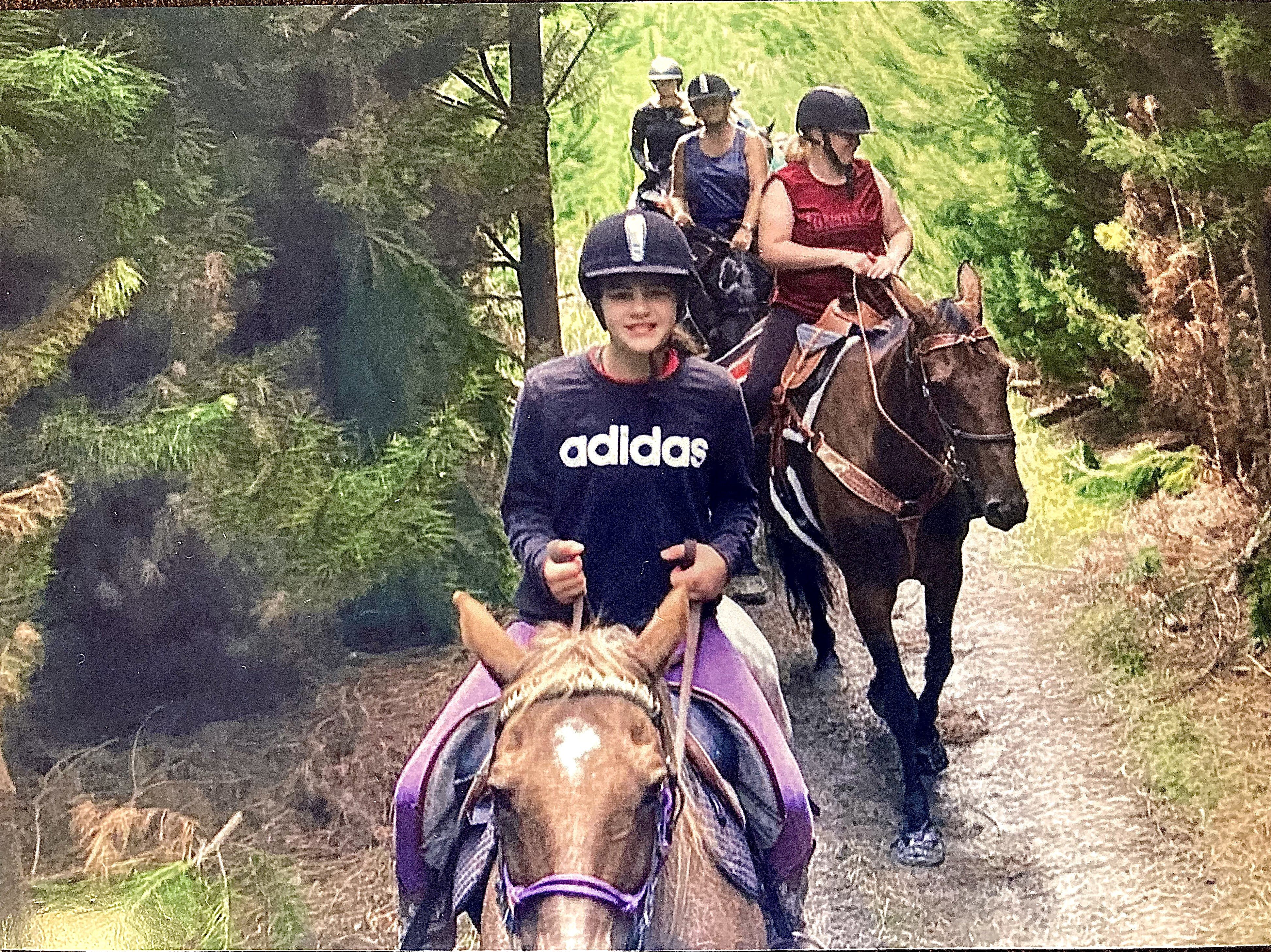 Jahna Hancox, 13, of Kaitangata, rides mum Erin Green’s horse Abby during a suicide awareness...
