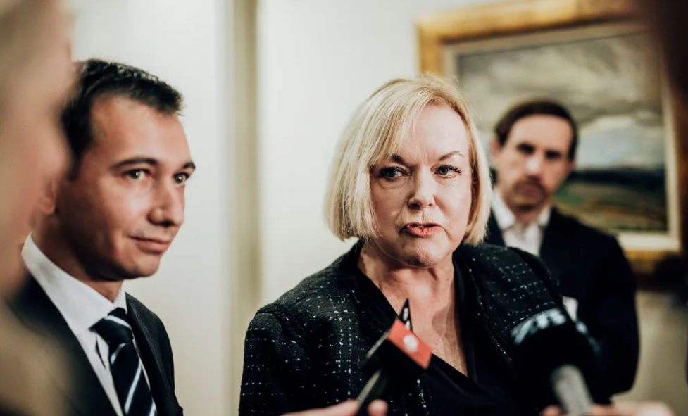 Health Minister Simeon Brown and Public Service Minister Judith Collins were among the group of...