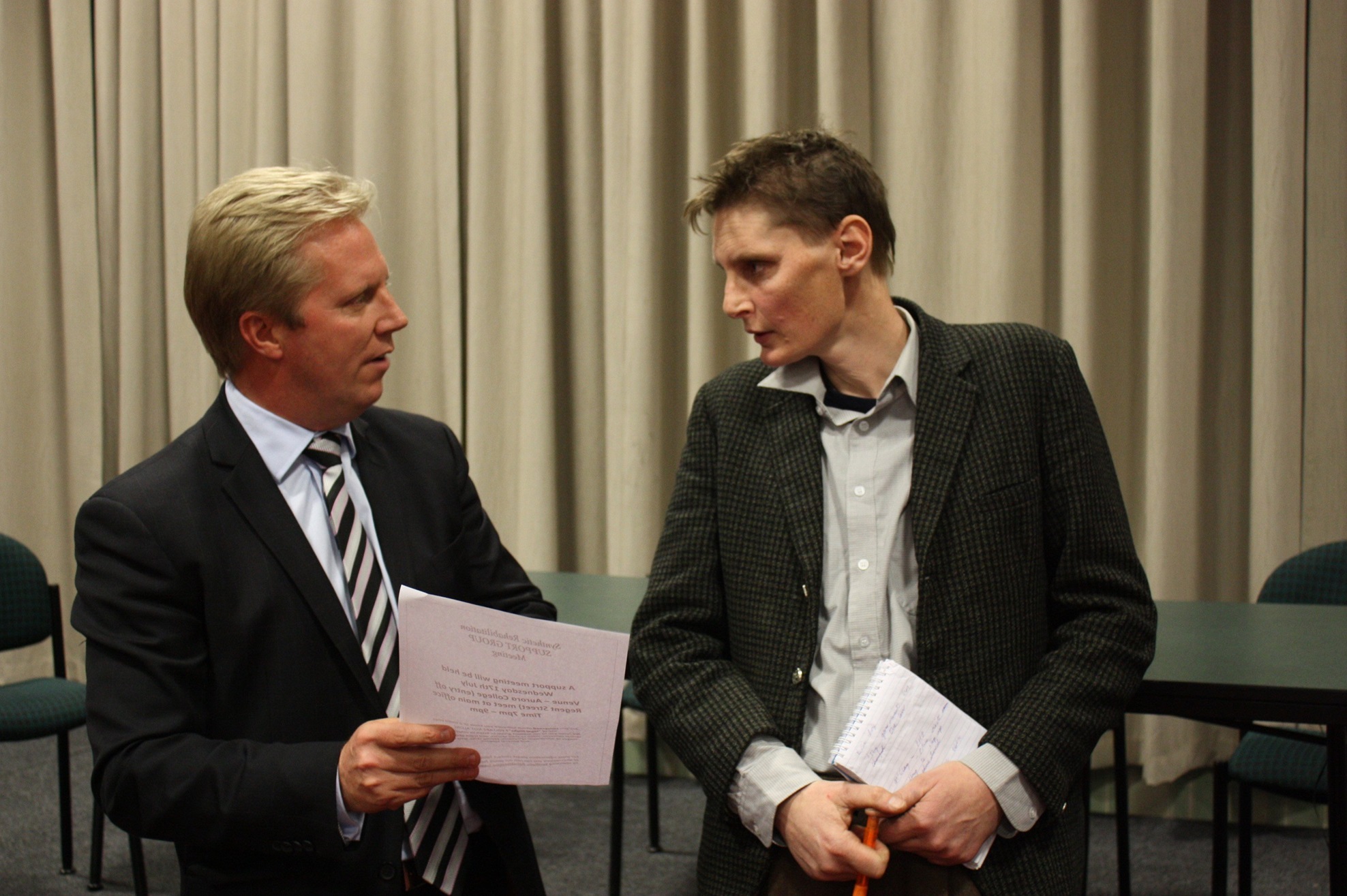 Colin Heath (right) talks to then associate minister of health Todd McClay in Invercargill in...
