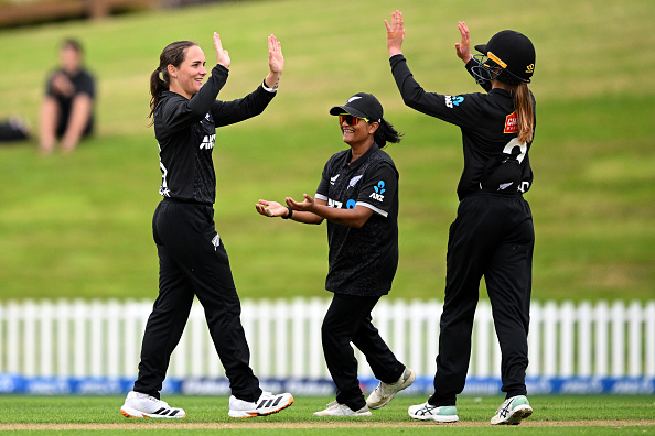 Melie Kerr (left) celebrates with White Ferns after the dismissal of  Zimbabwe's Adel Zimunhu at...