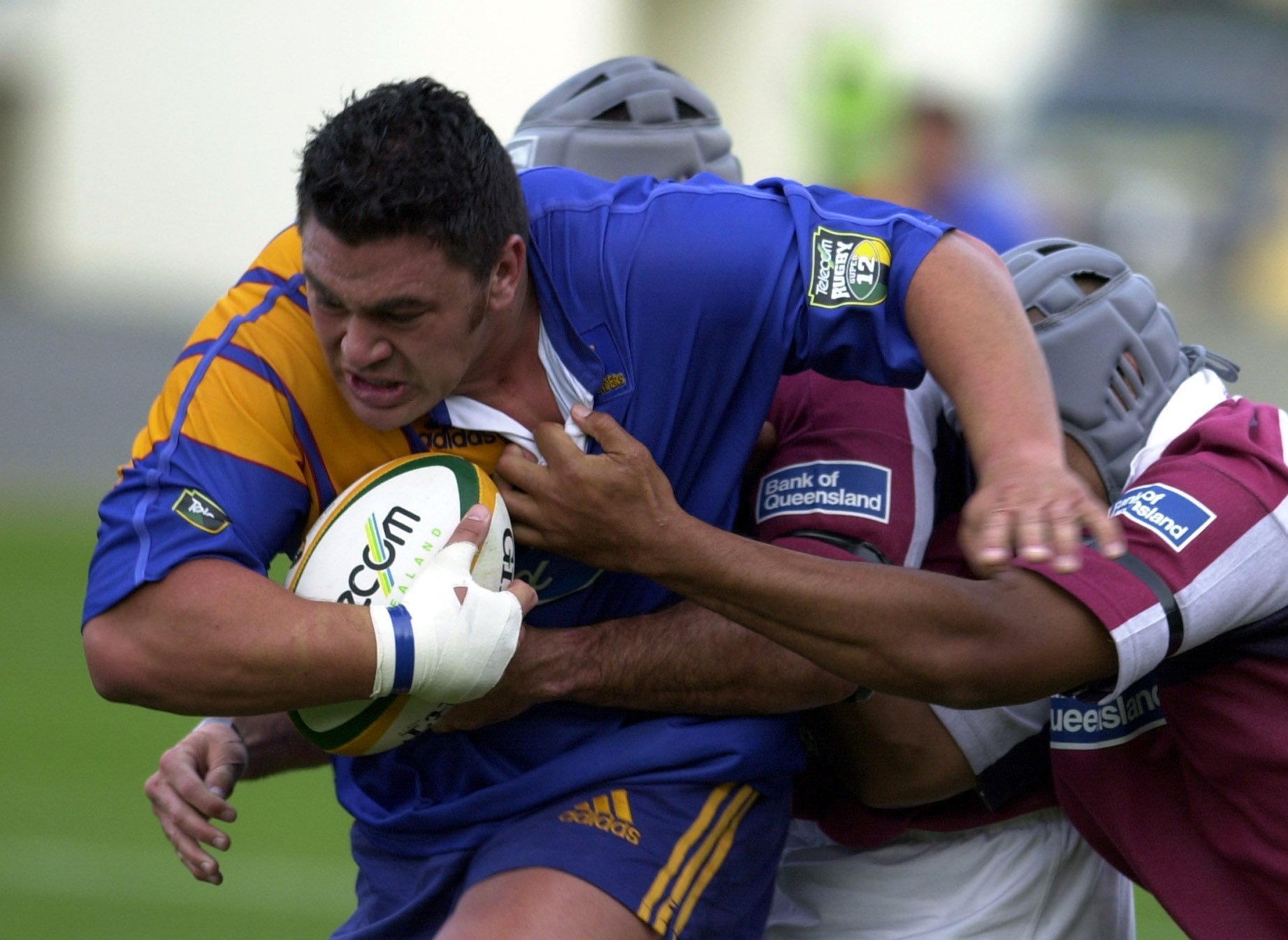 Highlanders prop Kees Meeuws on the charge against the Queensland Reds at Carisbrook in the 2000...