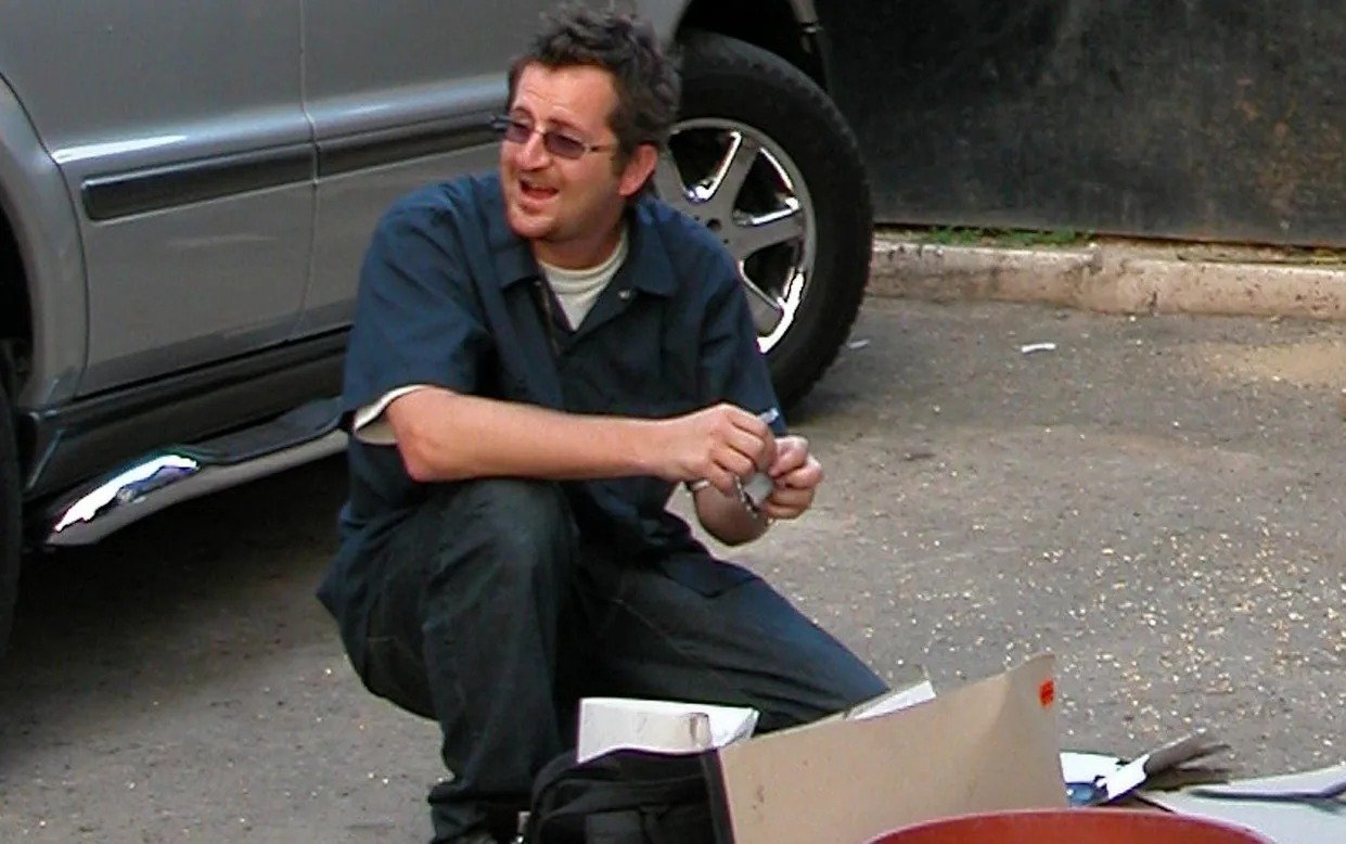 English artist Robin Gunningham is photographed working in Jamaica in 2004. The Mail on Sunday...