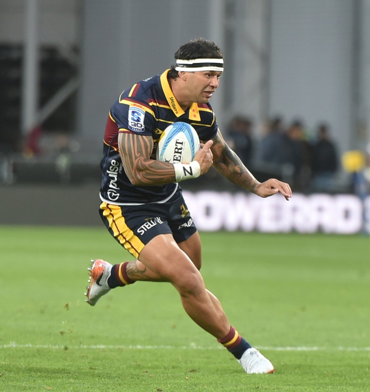 Highlanders centre Jonah Lowe looks for space during the Super Rugby Pacific season opener...