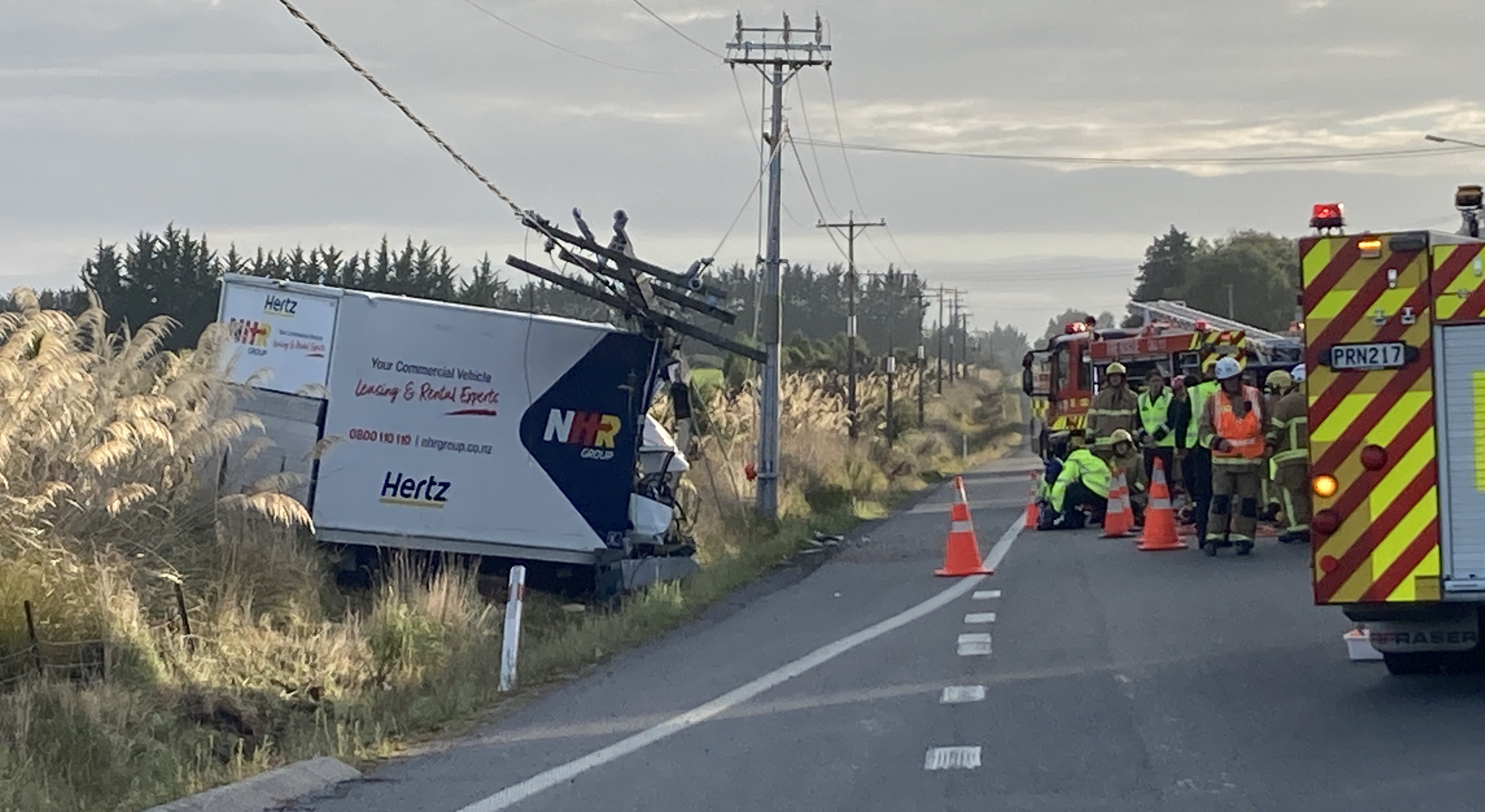 Emergency services on site where a van crashed into a power pole on Waihola Highway this morning....