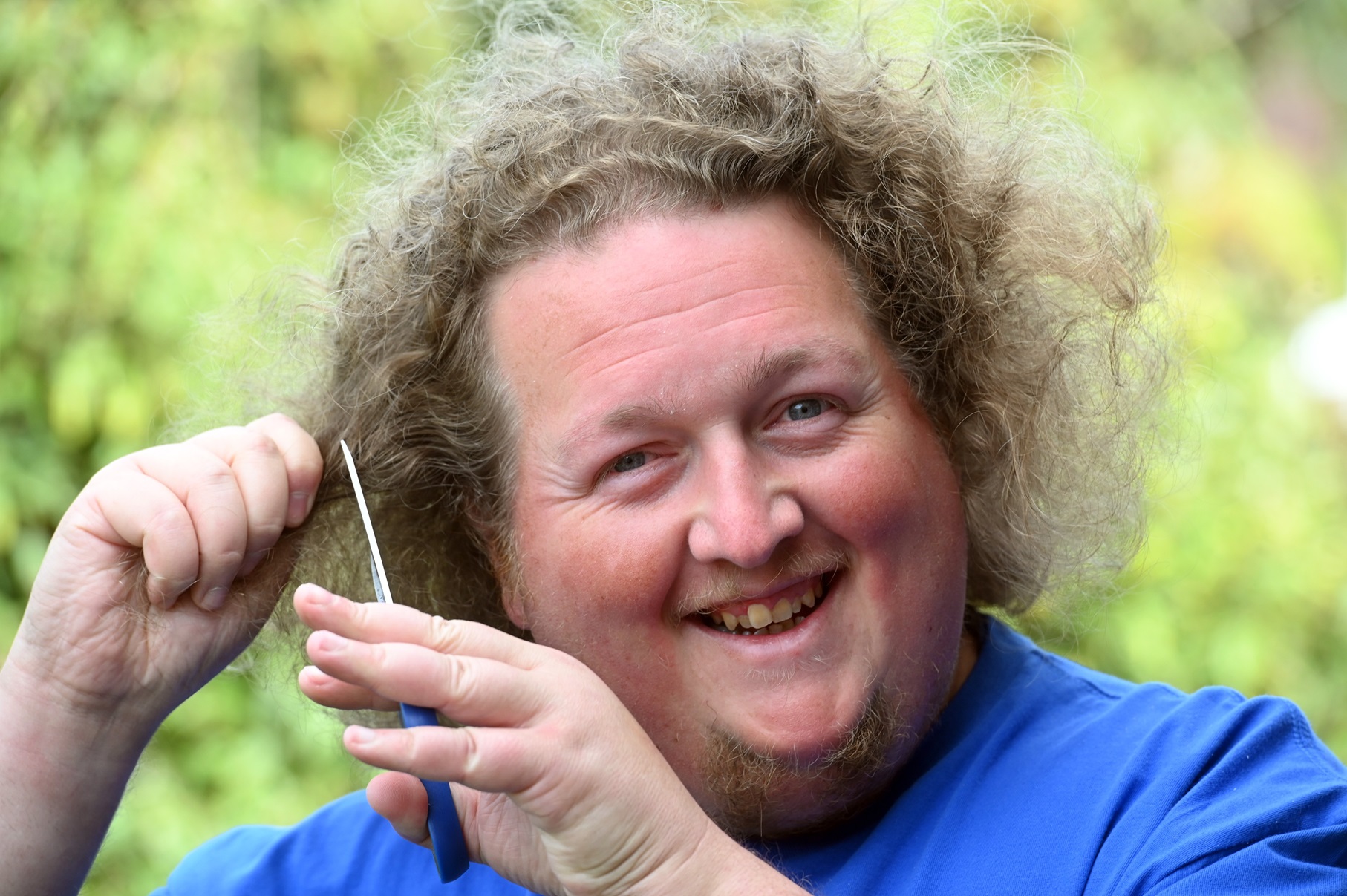 Daniel Lewis is taking care of his lengthening hair, in preparation for its removal on September...