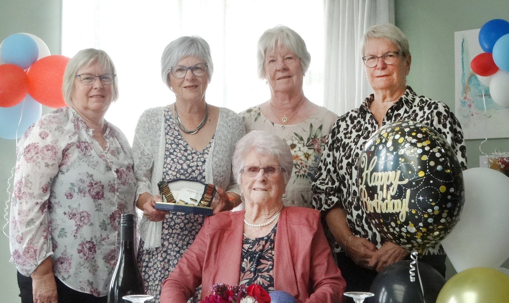 Gladys McKenzie (middle) celebrated her 100th birthday last week with her four daughters (back,...