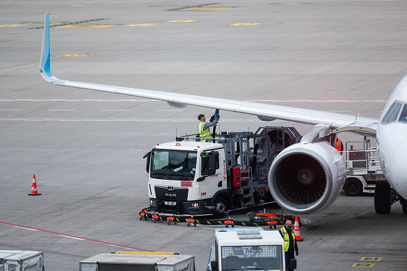 A plane is refueled on an airport runway. File photo: Getty Images