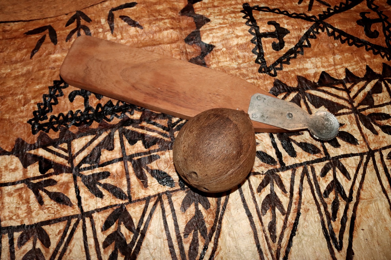 A modern example of a coconut scraper will be displayed.

