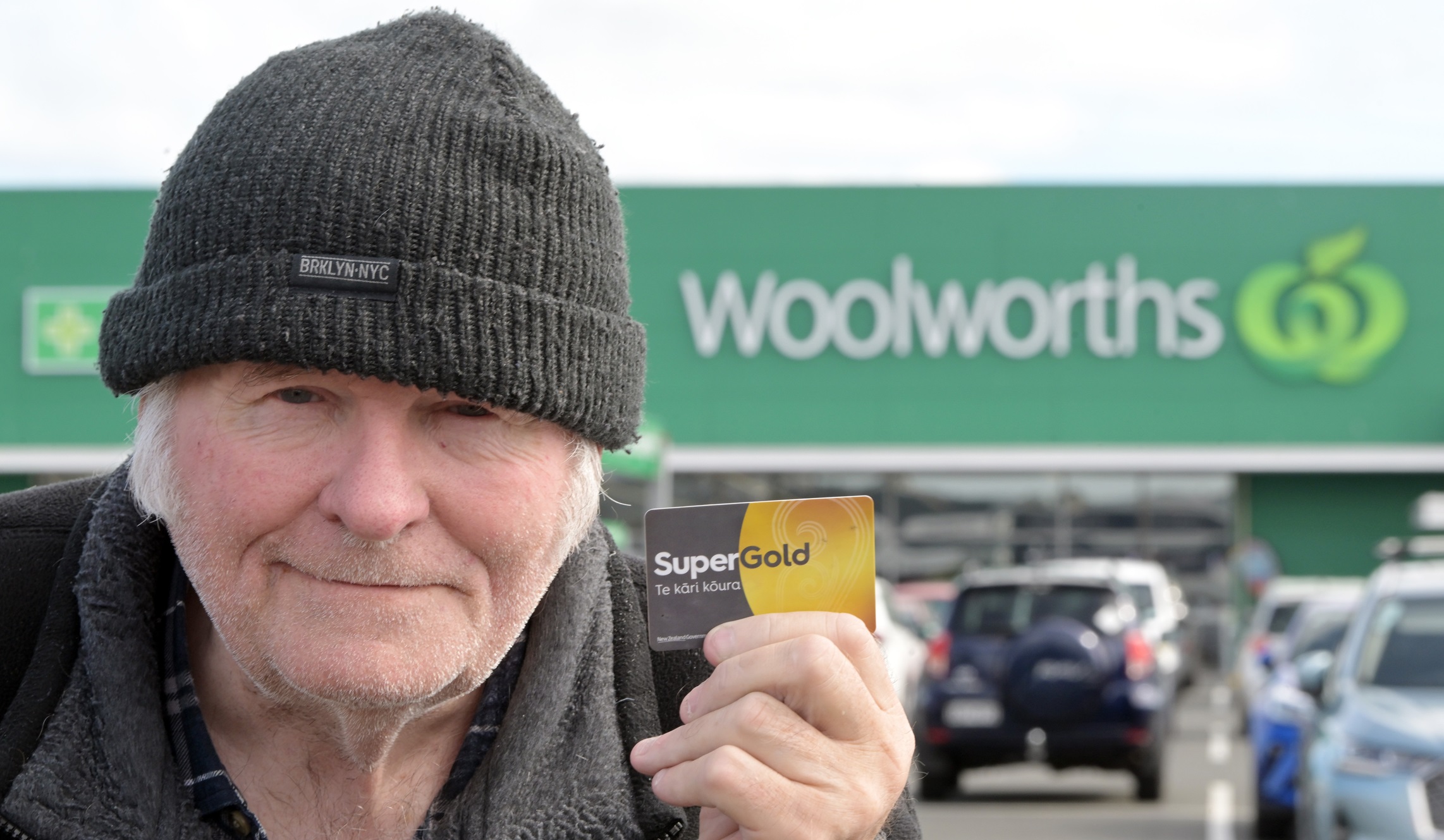 Dunedin pensioner Rob Donaldson holds his SuperGold Card outside Woolworths Dunedin South. Photo:...