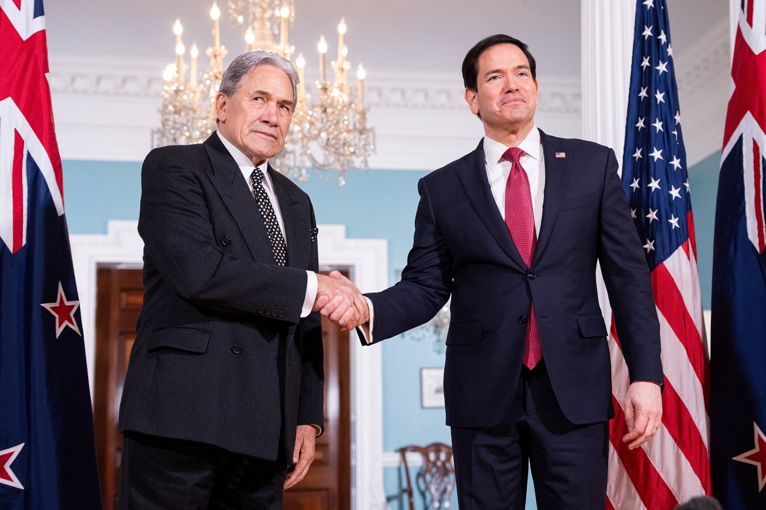New Zealand Foreign Minister Winston Peters (L) shakes hands with US Secretary of State Marco...