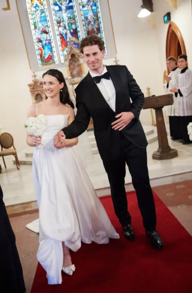 Josh Duymel and his wife on their wedding day. They attend regular Catholic mass together. Photo:...
