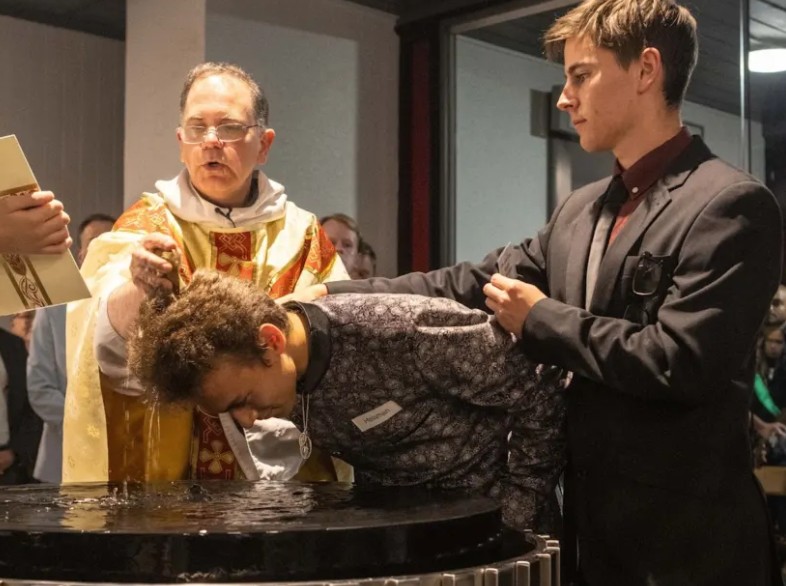 Helaman Hatcher at his Catholic baptism at Easter in 2024. Photo: Supplied