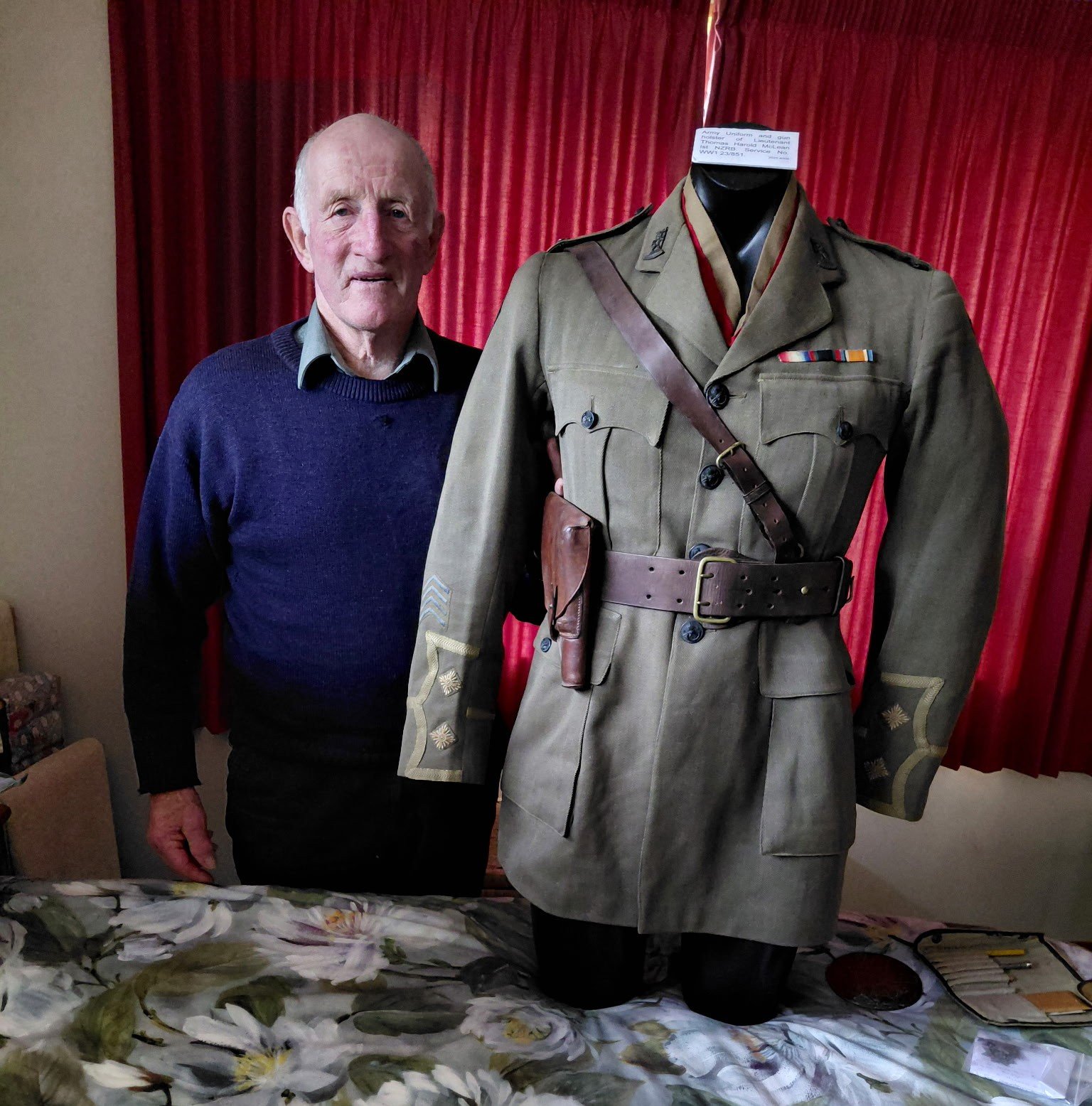 Tokanui Anzac Day organiser Bruce Lamb is setting up a display of Progress Valley farmer...