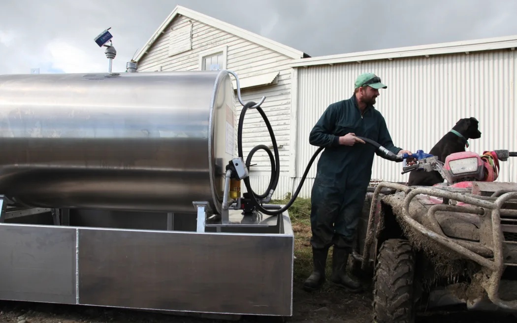 A farmer with his farm fuel tank featuring Levno sensors to monitor fuel withdrawals. Photo:...