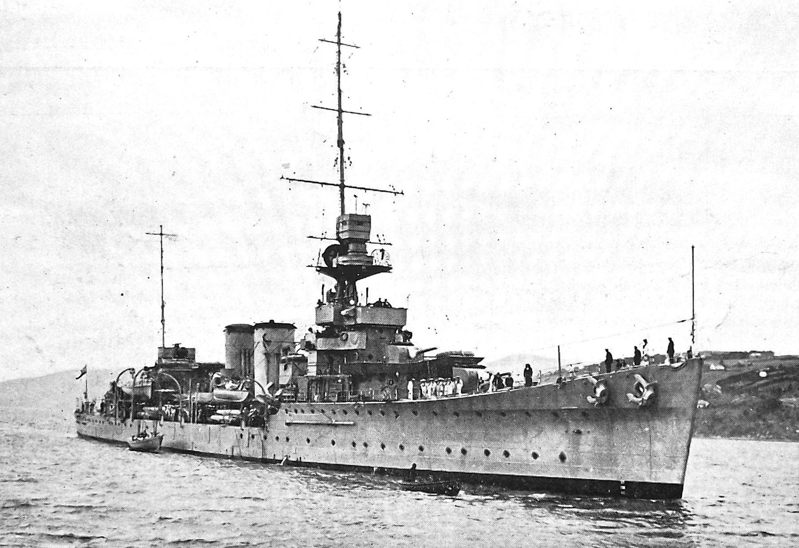Light cruiser HMS Dunedin, flagship of the Royal Navy New Zealand Division, arrives in Otago...