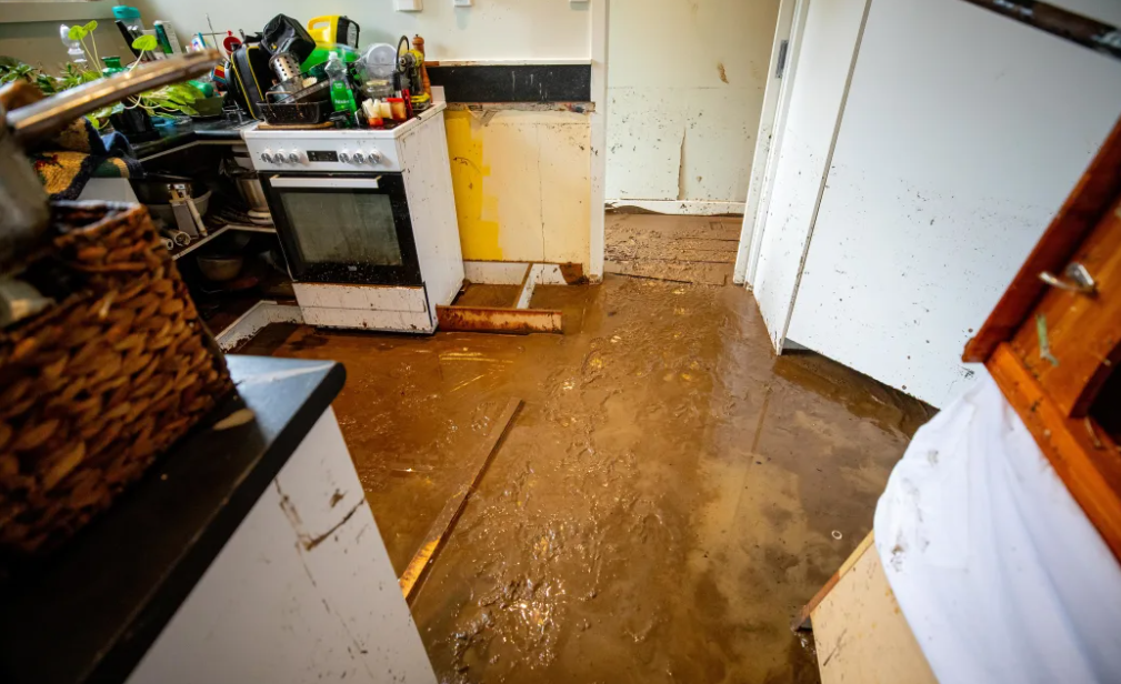 Muddy floodwaters that reached more than a metre-high inside the home. Photo: RNZ