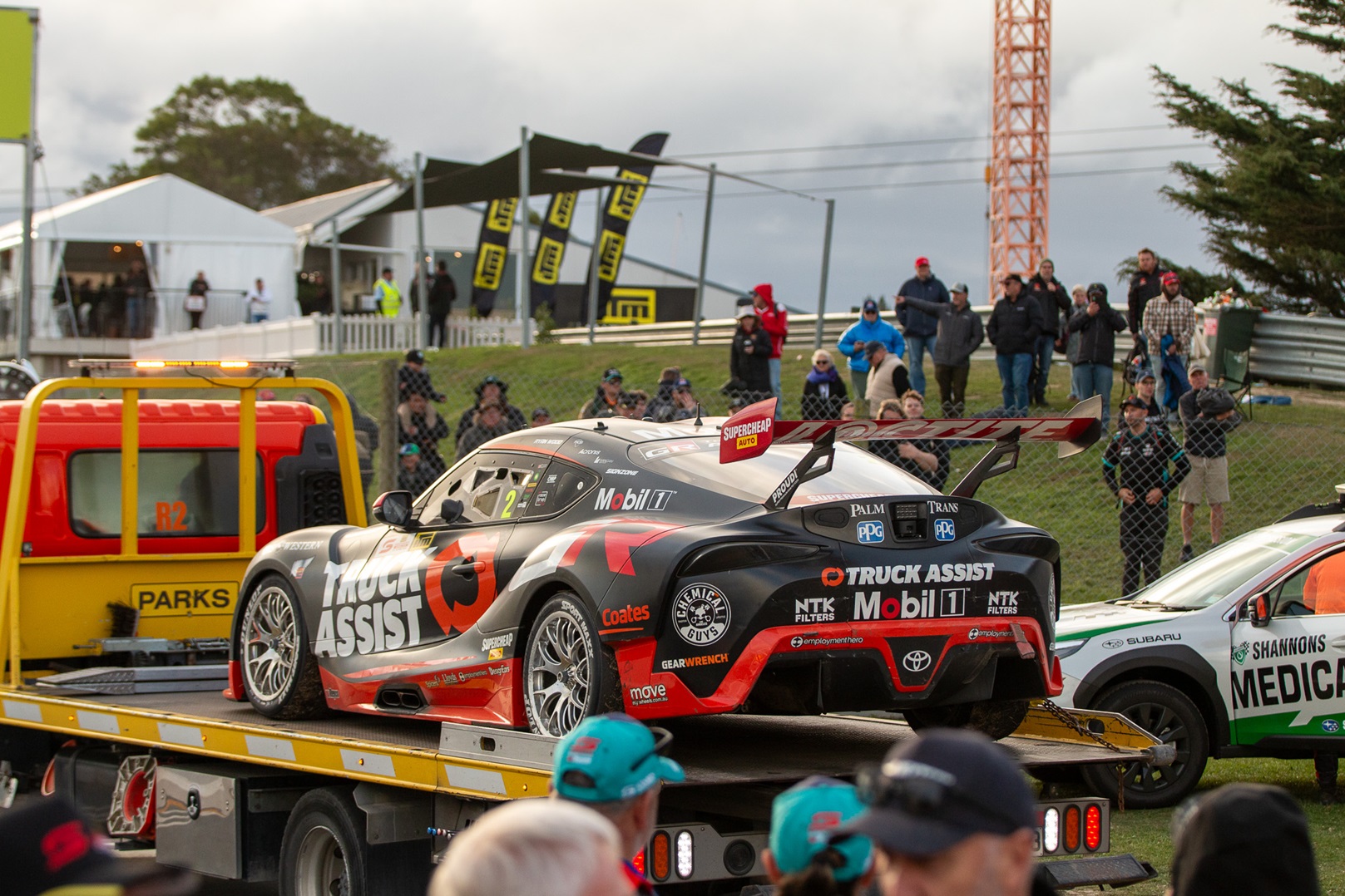 Ryan Wood's car arriving back on the back of a tow truck was not a scene the Kiwi fans wanted to...