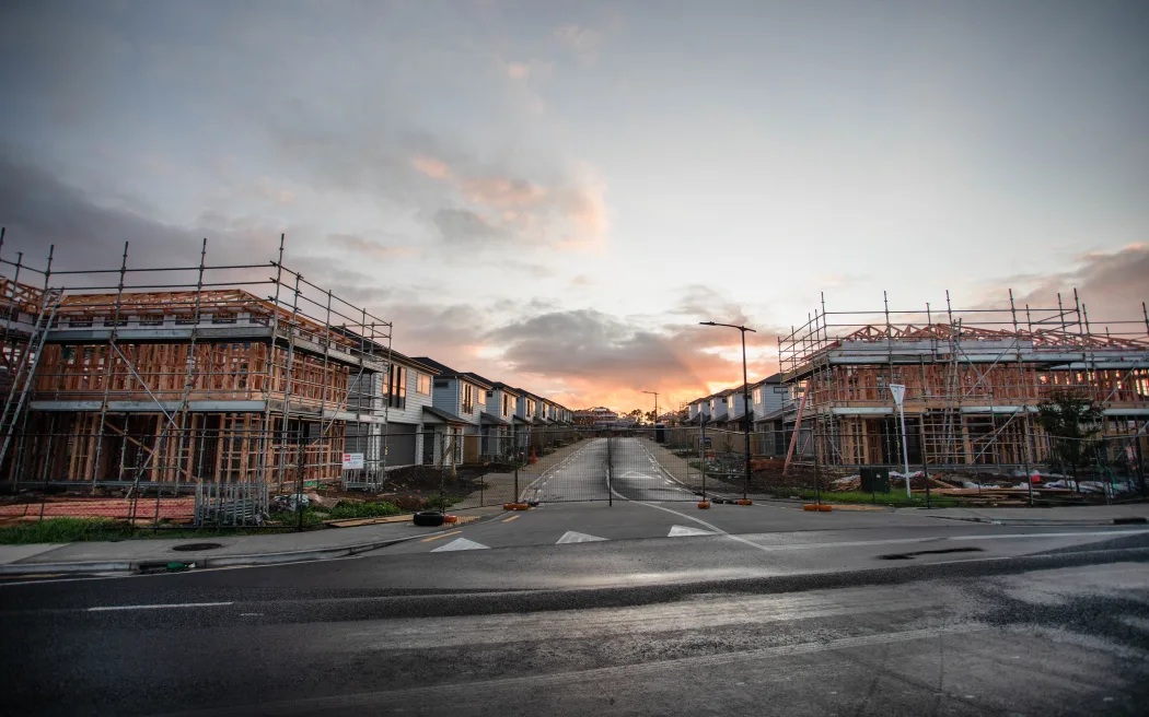A builder says there are many half-finished housing developments in Christchurch and Auckland....