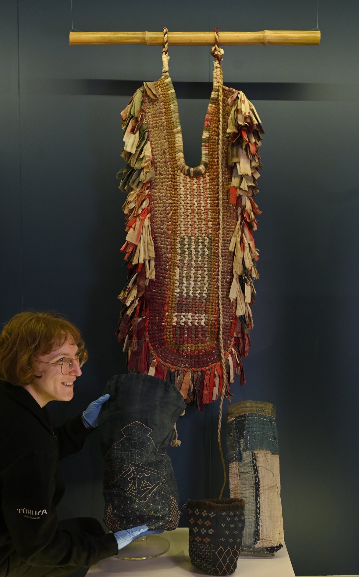 Tūhura Otago Museum humanities assistant collection manager Merryn Chynoweth with a selection of...