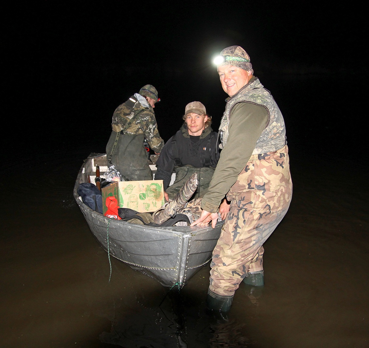 The Wilsons - Hamish, Cade and Brian - headed out on to Lake Tuakitoto about 6.30am. Photos: Nick...